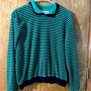 Vintage top. Labeled as a size L but fits like a M.